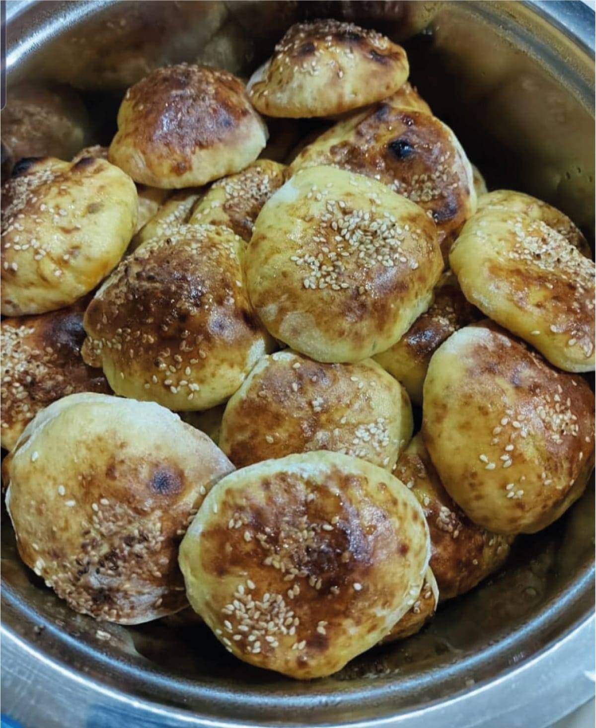 a bowl of baked goods from a delicious recipe of Arabic culture